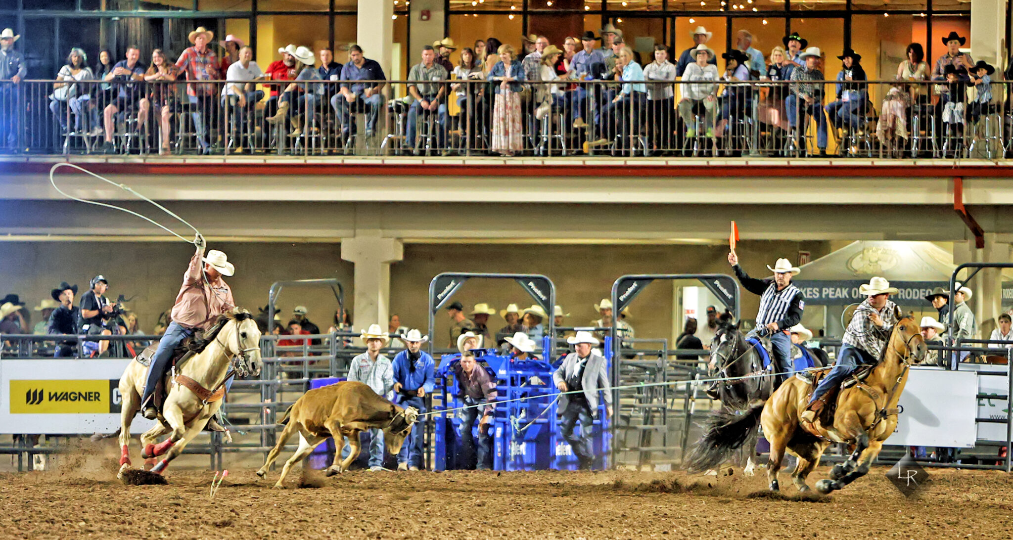 Hirdes and Pearce Win 2022 NFR Open Team Roping