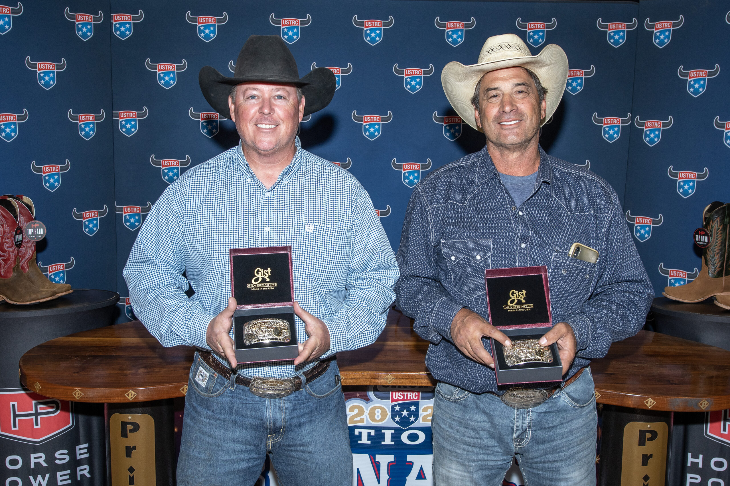 Ronnie Hill and Daniel Shehady pose with their buckles for winning the Horse Power Boots #8.5 Legends Over 50.