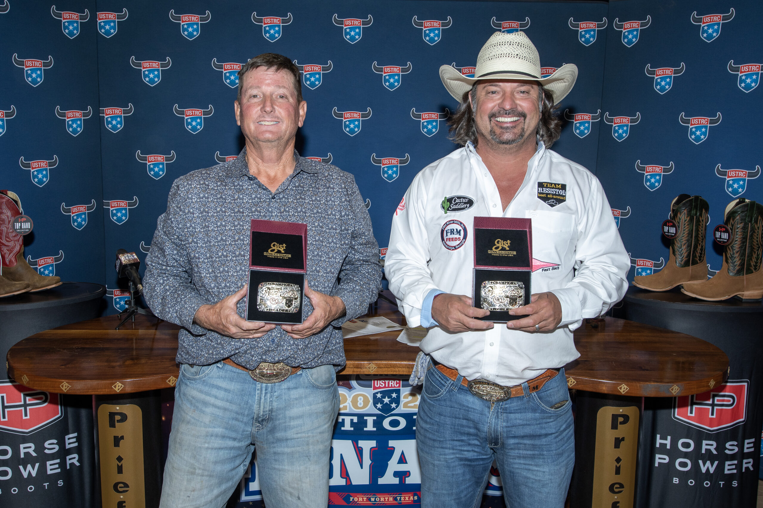 Kelly Cheatham and Brock Middleton with their buckles for winning the Horse Power Boots #9.5 Legends Over 50.