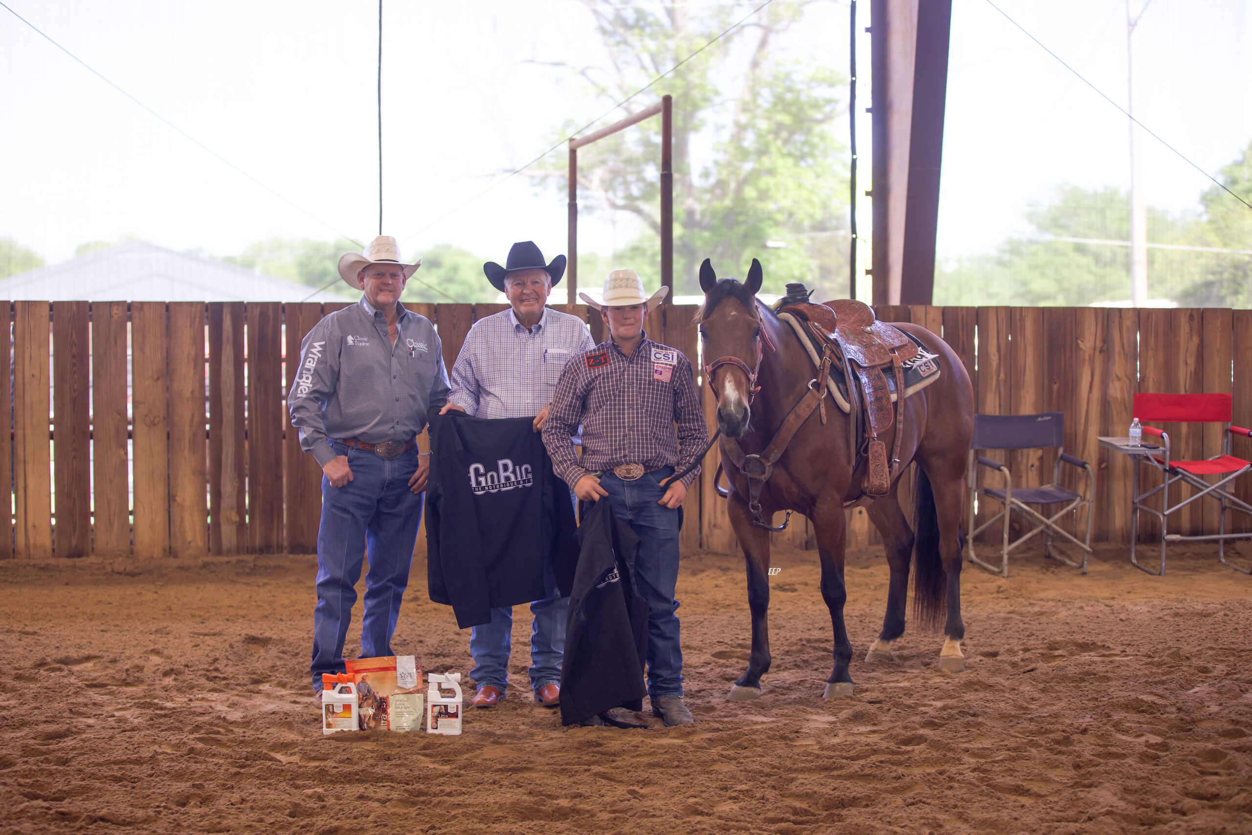 Haze Bruce posing with Smart Rey Movin at the 2023 American Rope Horse Futurity Association Oil Can Classic. Elite Equine Promotions photo.