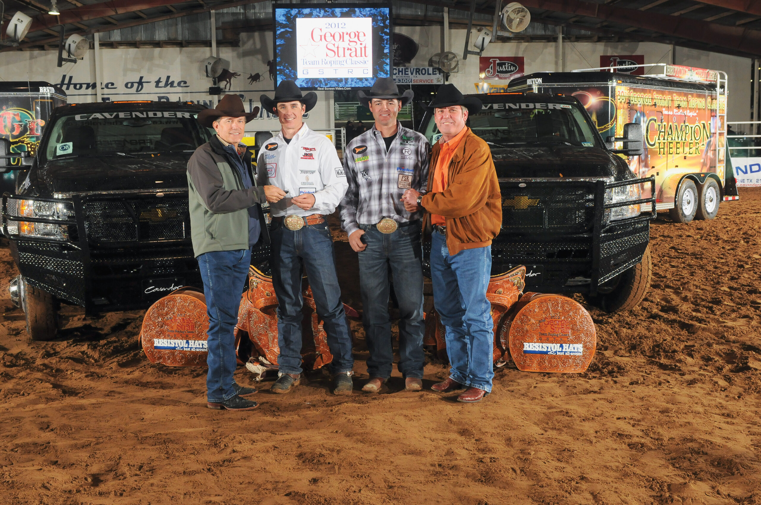 George Strait and Stewart Cavendar with 2012 George Strait Team Roping Classic winners Clay Tryan and Patrick Smith. 