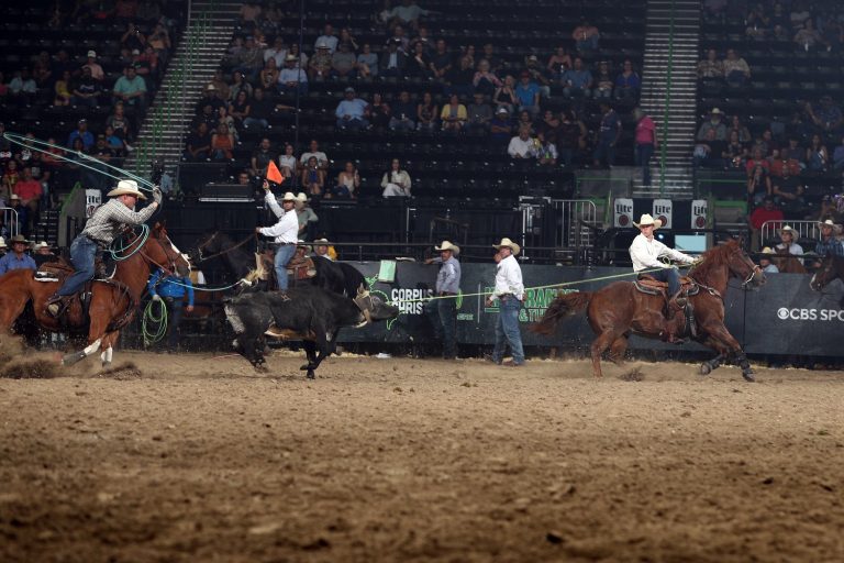 Riley Kittle and Jace Helton roping their steer in the Progressive Round of the 2023 Rodeo Corpus Christi. Image courtesy WCRA by Bull Stock Media.