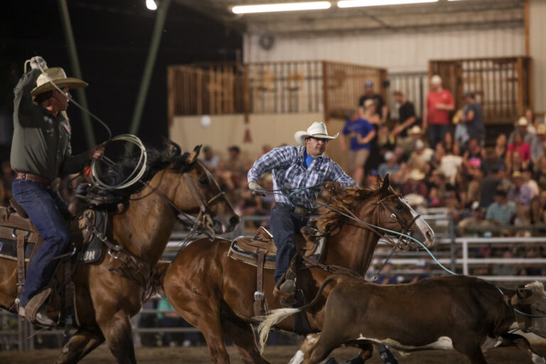 Korbin Rice heading a steer for Caleb Hendrix in Prineville, Oregon, 2024.